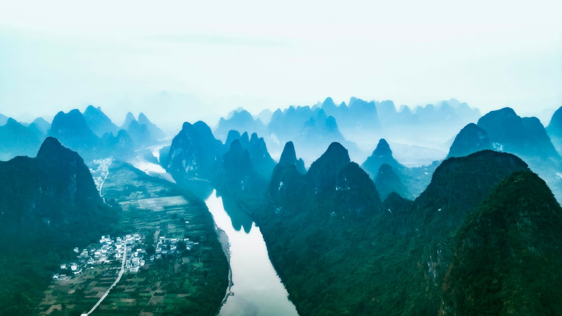 Layered karst peaks and the Li River seen from the air in the Guilin region